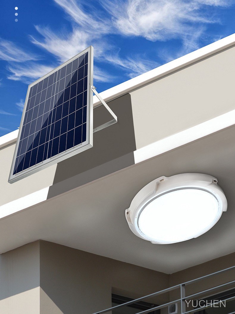 Solar panel mounted on the wall and solar ceiling light installed under the eave